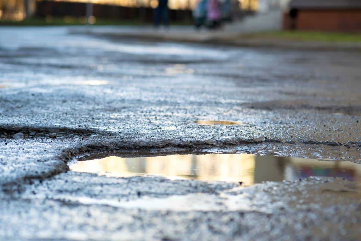 close-up-of-a-road-in-very-bad-condition-with-big-2026-01-06-09-53-35-utc (1)